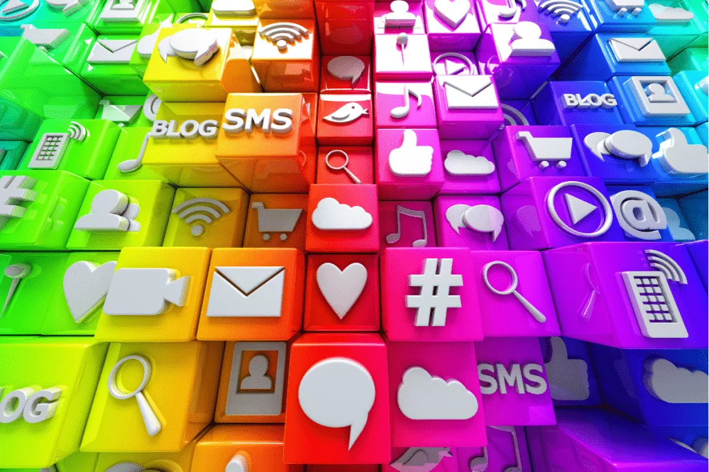 Colorful cubes with social media icons on them.